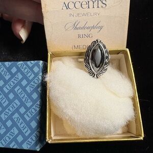 New in Box Avon Shadowplay Ring with Silver and Black Design